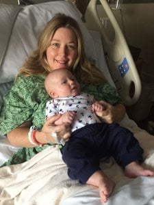 baby with his mom in hospital bed