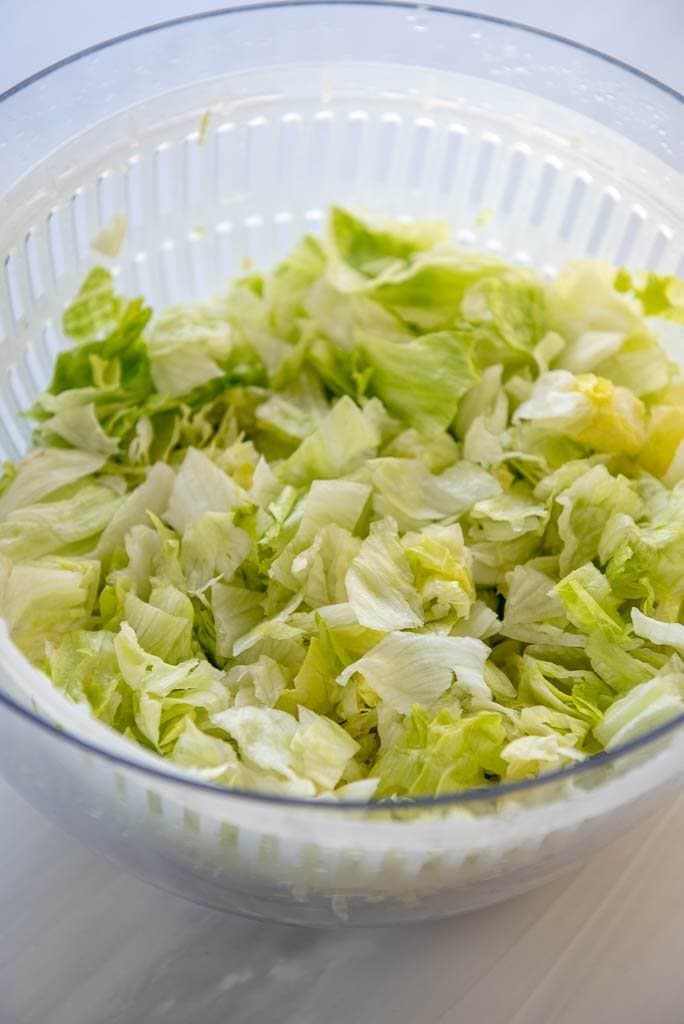 Overhead view of lettuce in a salad spinner