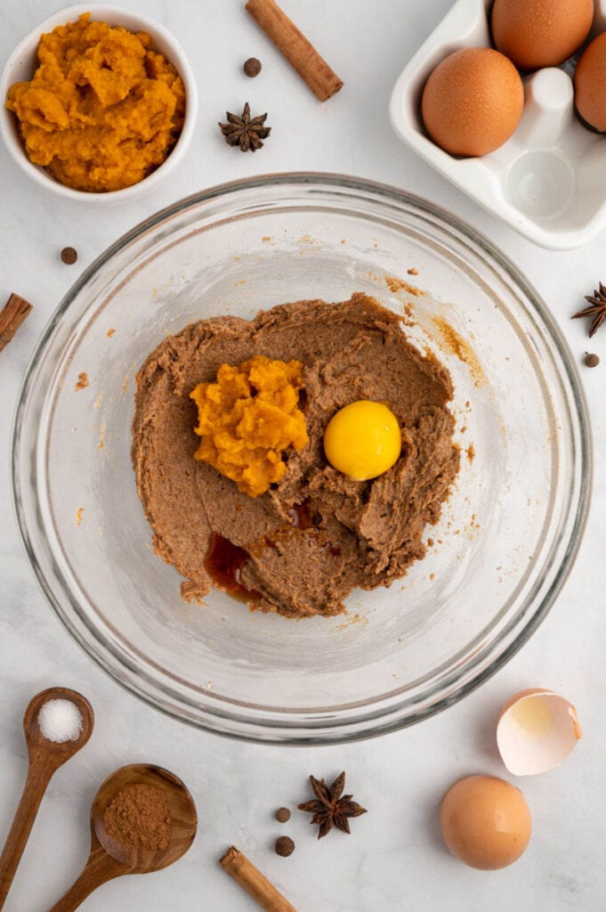 a bowl of ingredients for gluten free pumpkin cookies