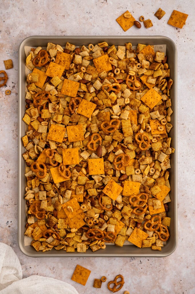 gluten free chex mix on a large baking pan